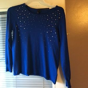 Women’s blue top with rhinestones
